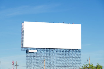 large blank billboard with city view background