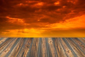 Fototapeta na wymiar Empty wooden table and beautiful summer sunset in background. Gr