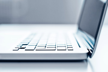 Close-up open laptop on table in the office