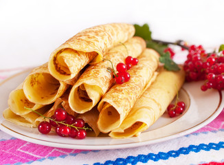 Delicious pancakes with red currant.