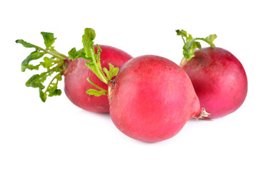 whole small radish with leaves on white background