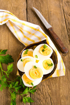 Boiled eggs with parsley