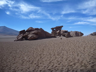 famous rock formation arbol de piedra in bolivian altiplano desert