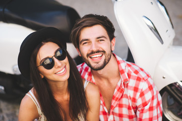 Happy loving hipsters couple embracing