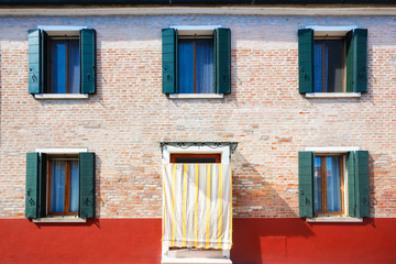 Fototapeta na wymiar Front door to the house on venetian island Burano, Venice, Italy