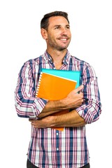 Man standing and holding notepads