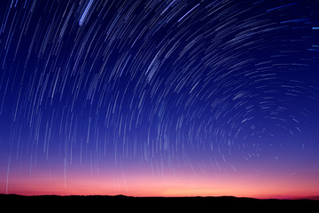 Beautiful star trail image during the night - Powered by Adobe