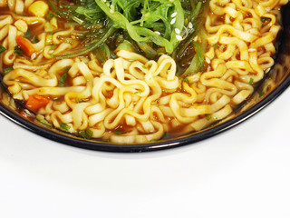 close-up instant noodle in black bowl