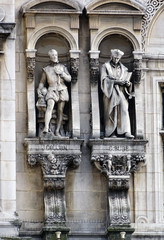 Obraz premium Sculptures of Jean Goujon and Guillaume Bude in Paris, France.