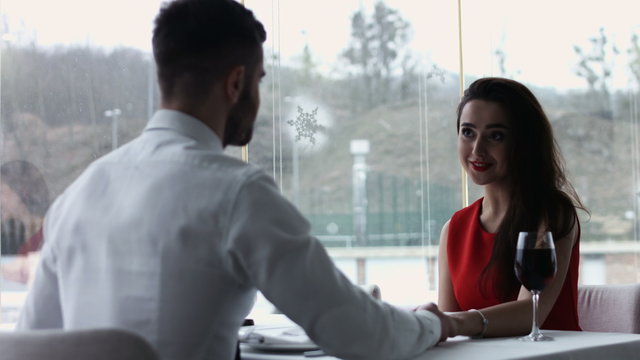 Middle age couple at the restaurant. couple interacting at lunch in a fancy restaurant