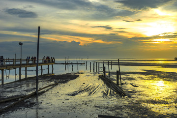 Jetty with sunset background