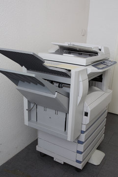 Modern Photocopier With Digital Display Isolated At Office