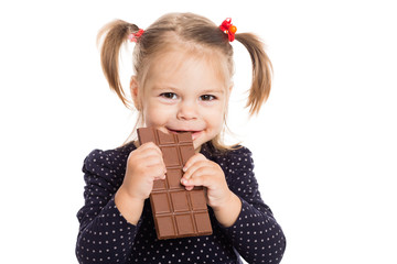 Cheerful girl eating chocolate