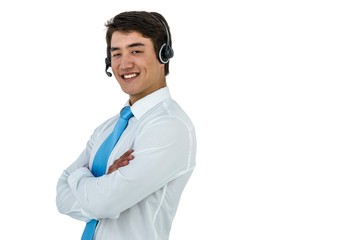 Smiling asian businessman using headset