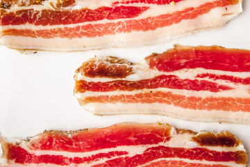 Streaky bacon on the white  background horizontal