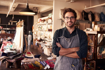 Portrait Of Male Owner Standing In Gift Store