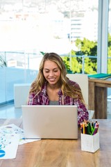 Young girl uses his computer