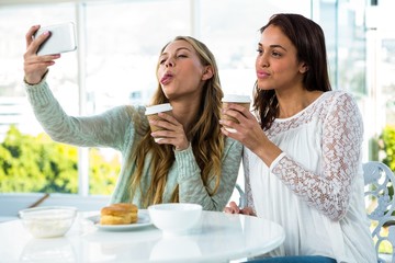 two girls take a selfie