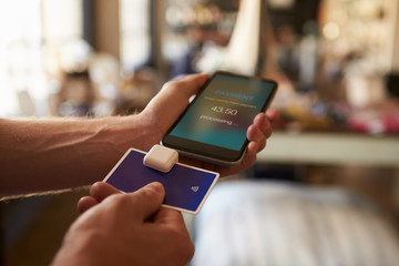 Credit Card Payment App Attached To Mobile Phone