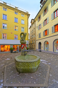 Fountain with sheep statue in the Old City of Chur