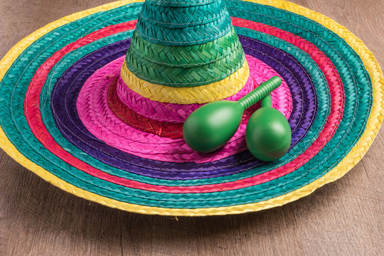 Mexican background with sombrero and maracas