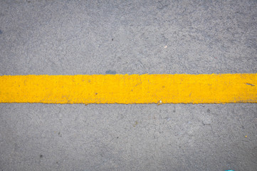 yellow line on asphalt road texture