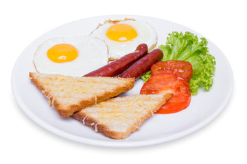 English breakfast with fried eggs, sausages, toasts and fresh salad, closeup