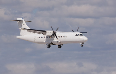 White body propeller aircraft in flight 