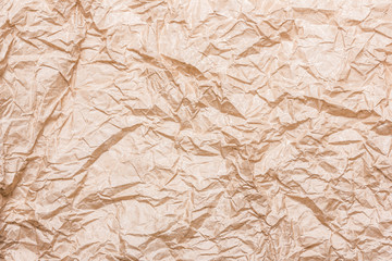 Brown crumpled paper background.