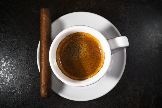 Cigar with an espresso coffee