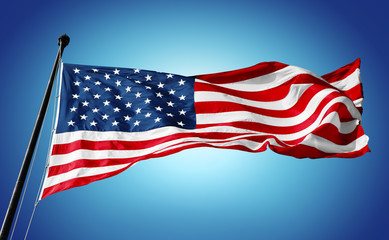 The national flag of the United states on blue sky