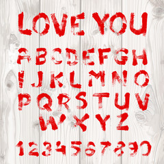 Hand drawn font red paint on texture white wood