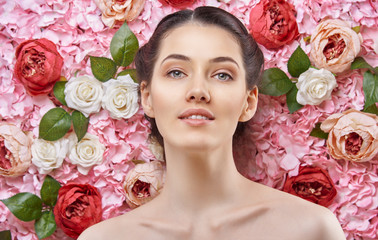 woman on a background of flowers