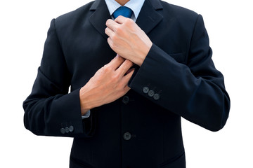 Businessman rearrange his neck tie