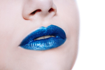 Woman lips with glossy blue lipstick