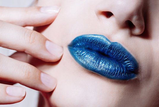 Woman Lips With Glossy Blue Lipstick