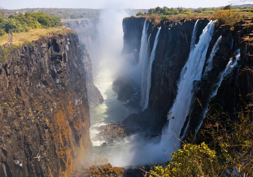 View of Victoria Falls from the ground. Mosi-oa-Tunya National park. and World Heritage Site.  Zambiya. Zimbabwe. An excellent illustration.