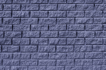The brickwork texture. Purple wall
