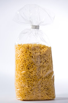 package of greek noodles on white background