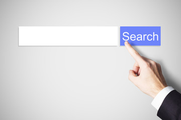 finger pushing blue web search button