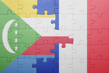 puzzle with the national flag of comoros and france