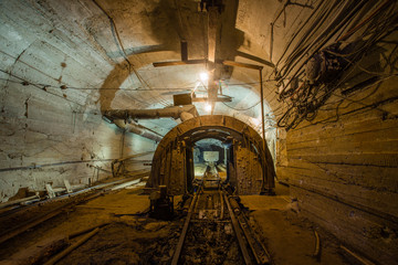 Fototapeta na wymiar Underground gold mine wagon