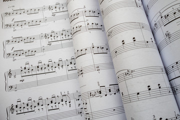 Naklejka premium Sheet Music Background Musical Notes with selective focus
