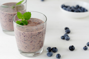 Fototapeta na wymiar blueberry milk shake with berry
