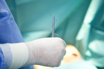 breast augmentation surgery in the operating room surgeon tools implant