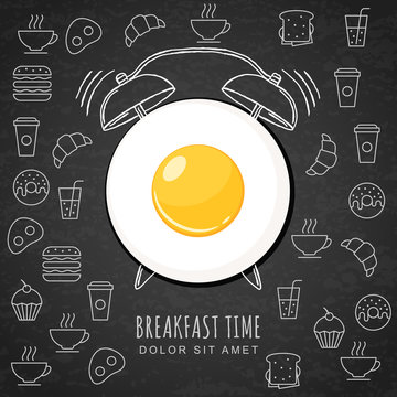 Fried egg and hand drawn watercolor alarm clock on textured blac