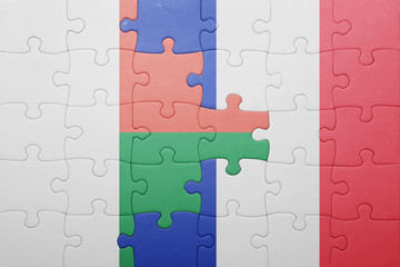 puzzle with the national flag of madagascar and france