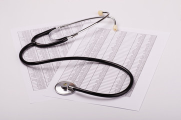 Stethoscope on financial statement