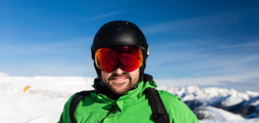 Fototapeta na wymiar Happy skier with large oversized ski goggles