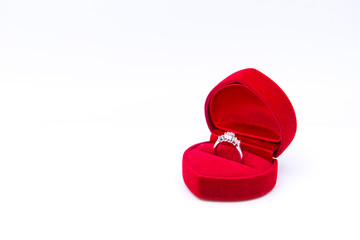 Diamond ring in the red heart box isolated on white background